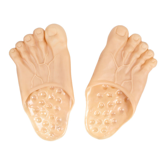 Pair of skin-tone giant foot slippers on white