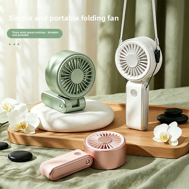 Foldable mini handheld fan with USB charging, photo 1