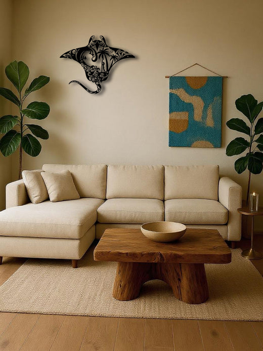 Metal beach wall decor mounted above a sofa