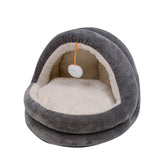 Cat peeking out of the yurt pet bed's dome opening