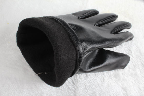 Inside cuff of a black leather glove showing the soft napped lining