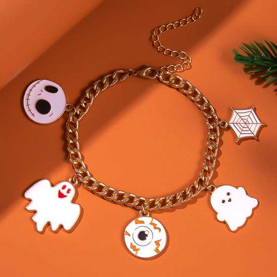 Halloween themed bracelet with pumpkin head, ghost wizard hat, festive ornaments