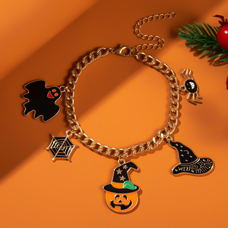 Halloween themed bracelet with pumpkin head, ghost wizard hat, festive ornaments