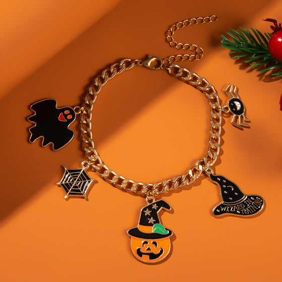 Halloween themed bracelet with pumpkin head, ghost wizard hat, festive ornaments