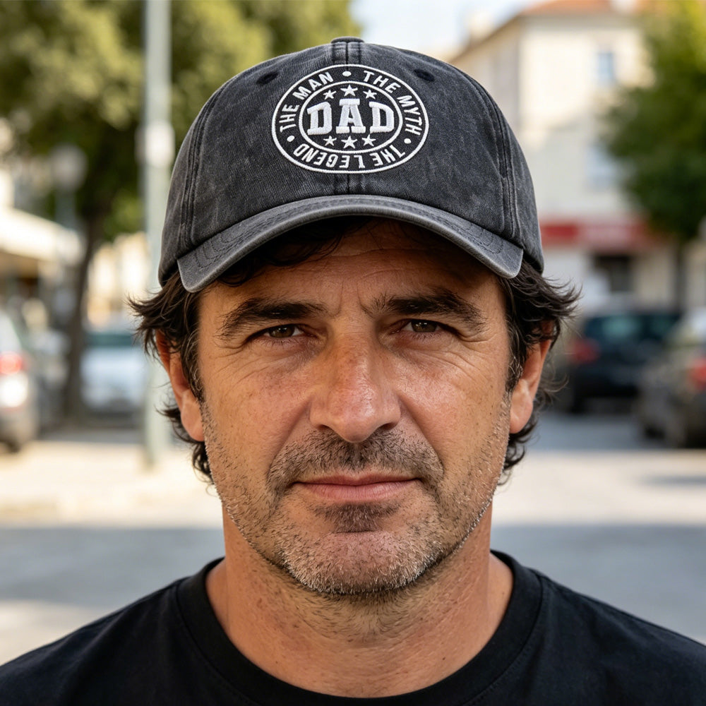 Man wearing the black washed DAD The Man The Myth The Legend baseball cap