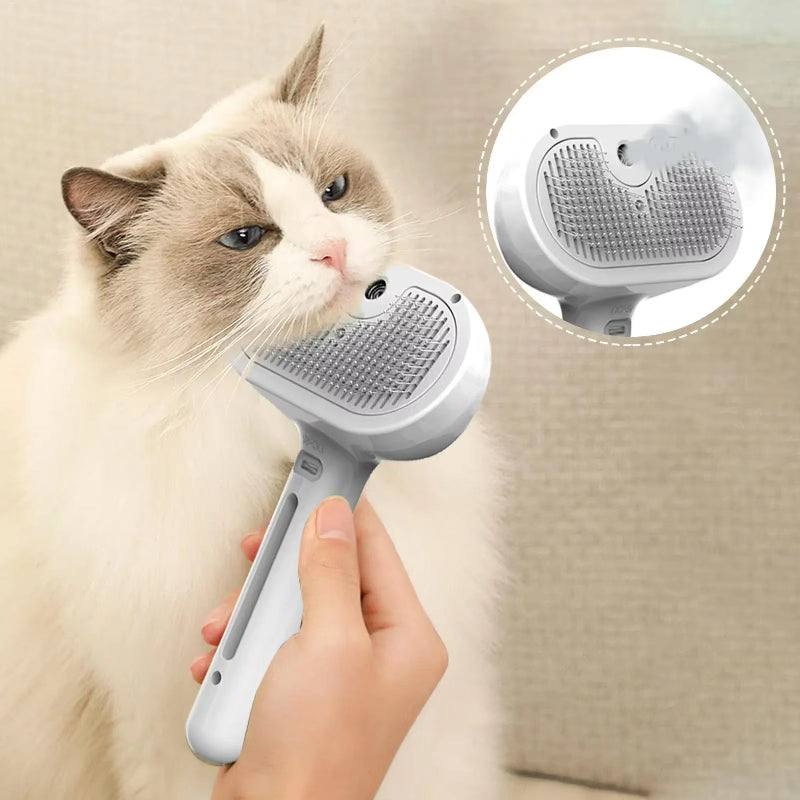 Cat being brushed with pet grooming brush