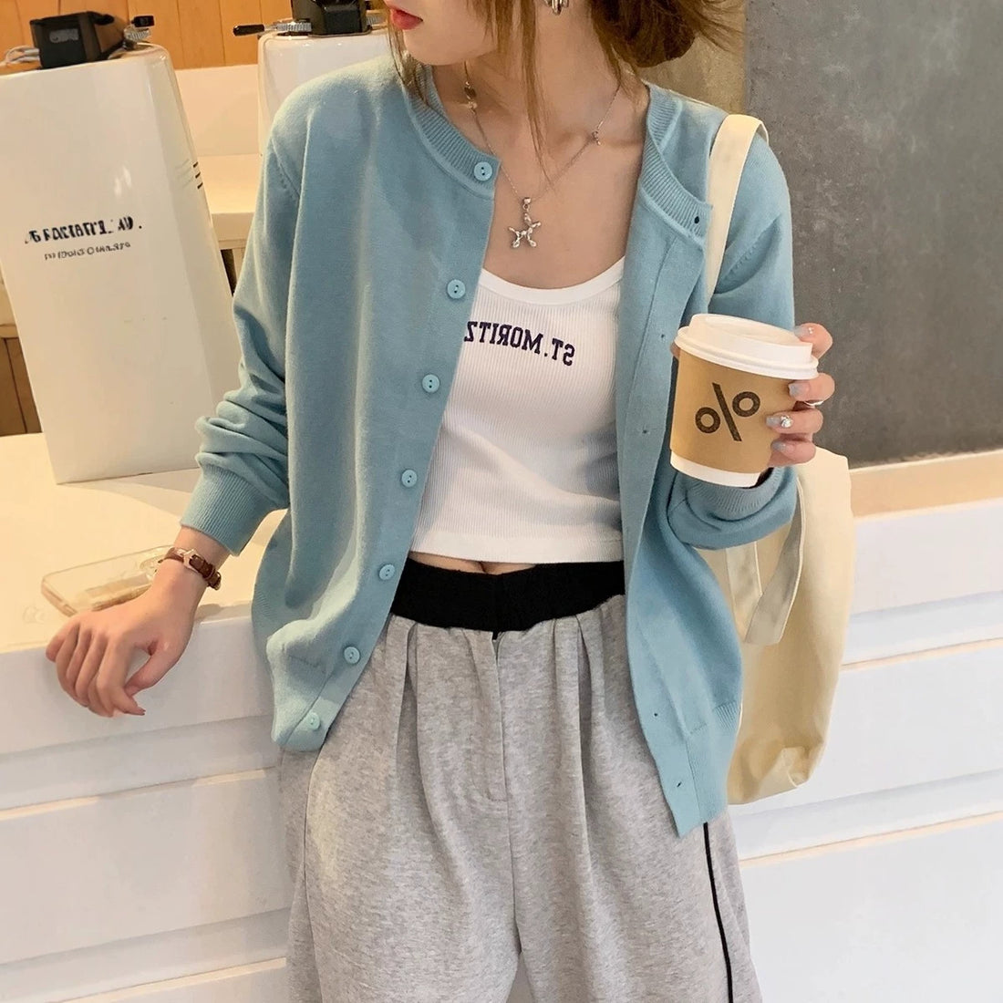 Women's long sleeve solid color knit cardigan with buttons, photo 2