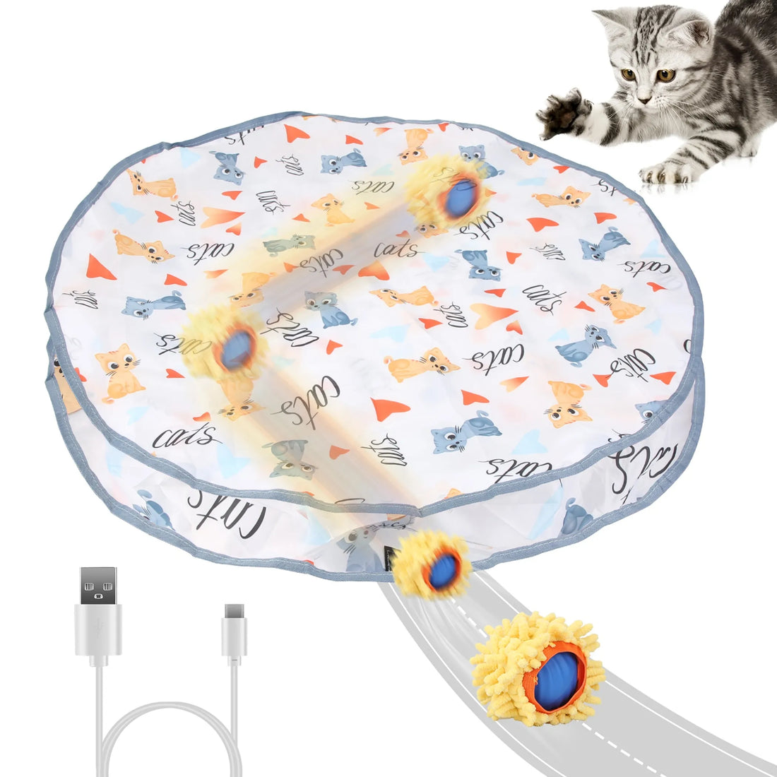 Two cats playing with the rolling toy ball