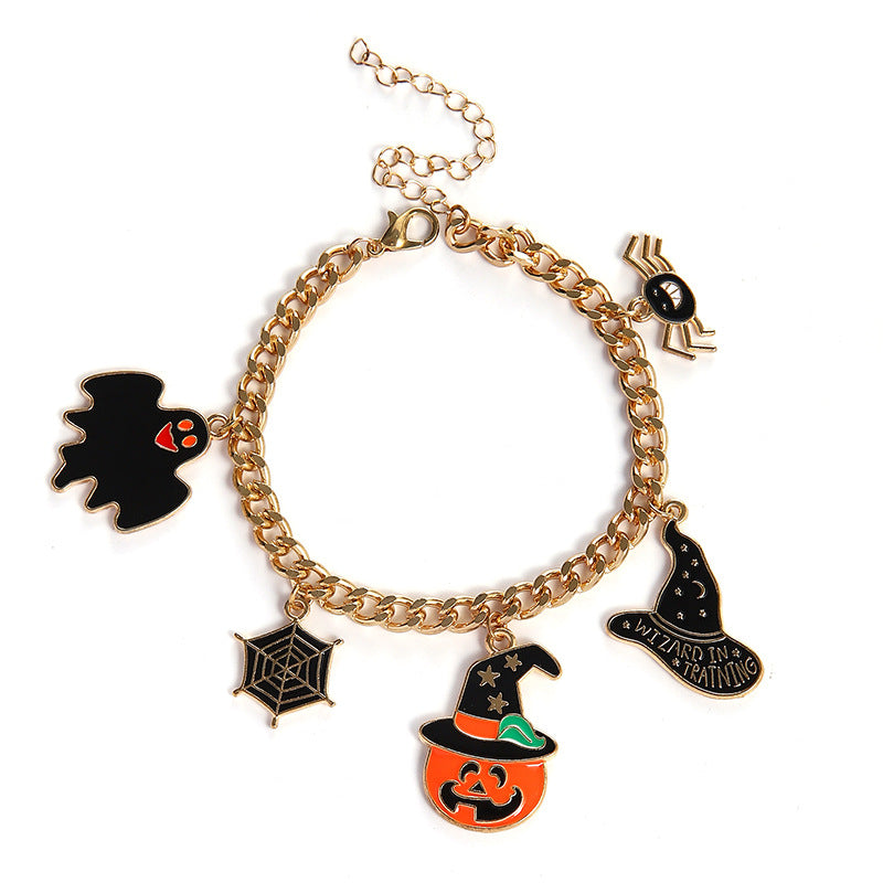 Halloween themed bracelet with pumpkin head, ghost wizard hat, festive ornaments