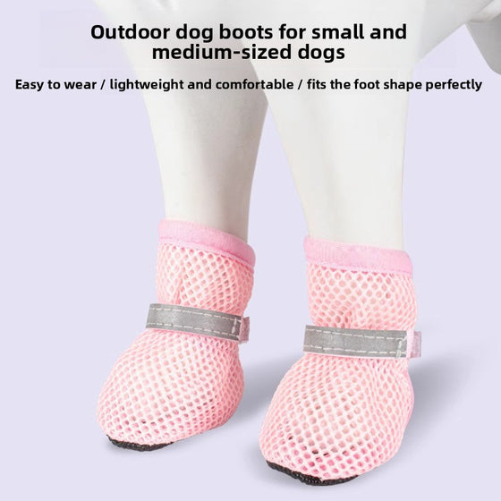 Pink mesh dog shoes with a gray reflective strap