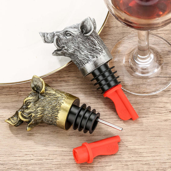 Dark silver and bronze wild boar head wine pourers with red spout caps