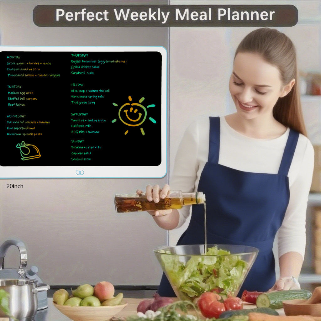 Woman using the 20 inch LCD writing tablet as a weekly meal planner in a kitchen