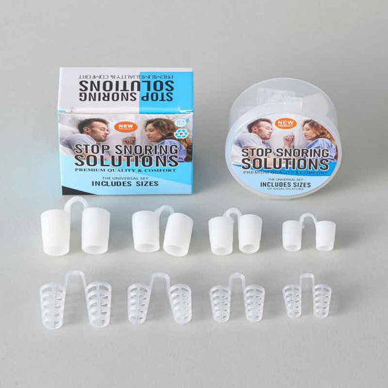 Stop Snoring Solutions box and round case with eight white silicone nose clips