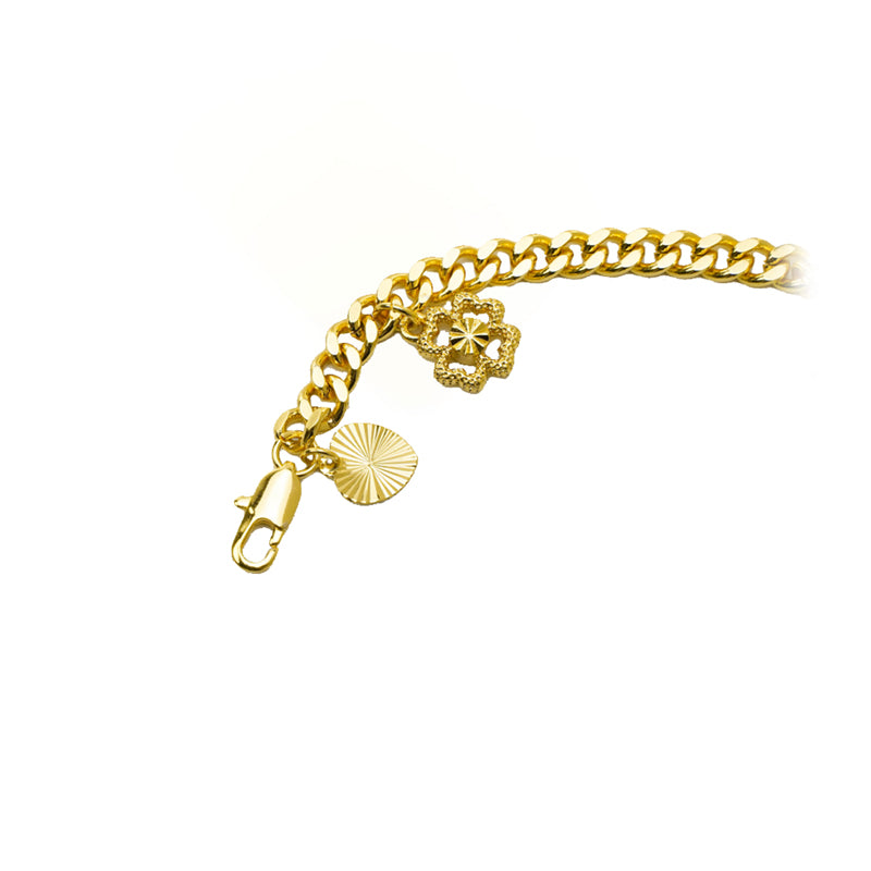 Lobster clasp and round tag of the gold four-leaf clover bracelet, close-up