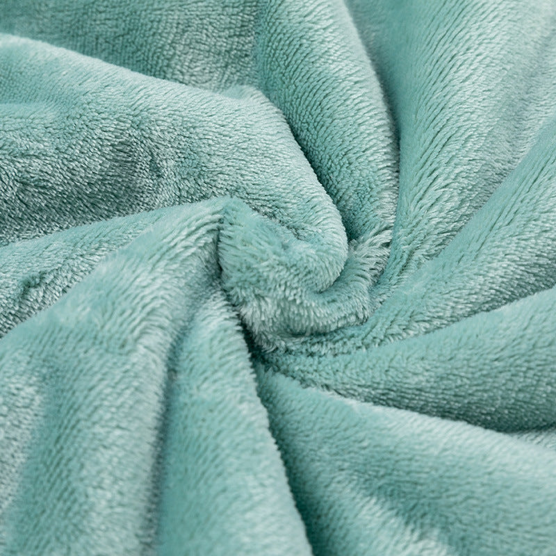 Reversible flannel and sherpa pet blanket on a sofa, photo 2