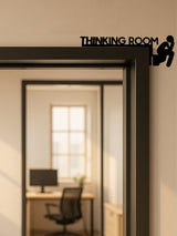 Modern metal toilet door sign mounted on bathroom door