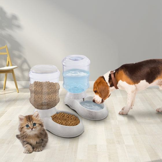 Puppy drinking from the gravity waterer next to a matching food feeder and kitten