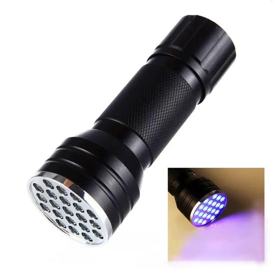Purple UV flashlight aluminum body with LED head lit in UV
