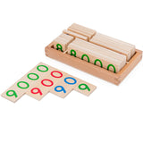 Child using the wooden number cards