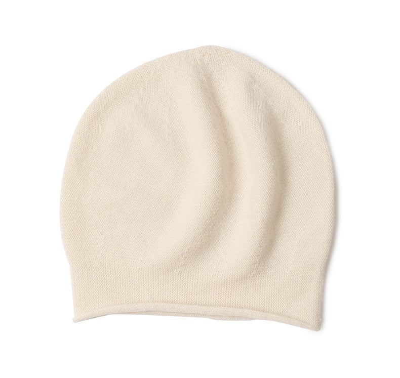 Women's cashmere knit beanie with short curled brim, photo 6