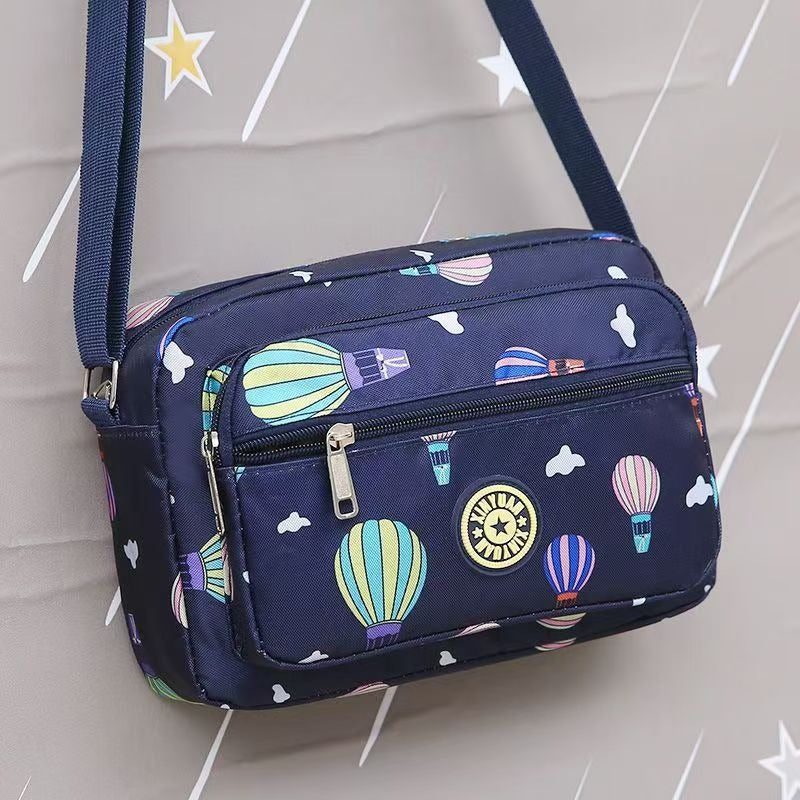 Small printed nylon crossbody bag with zipper, photo 2