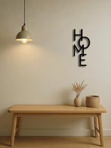 Close-up of matte metal finish on HOME letter sign