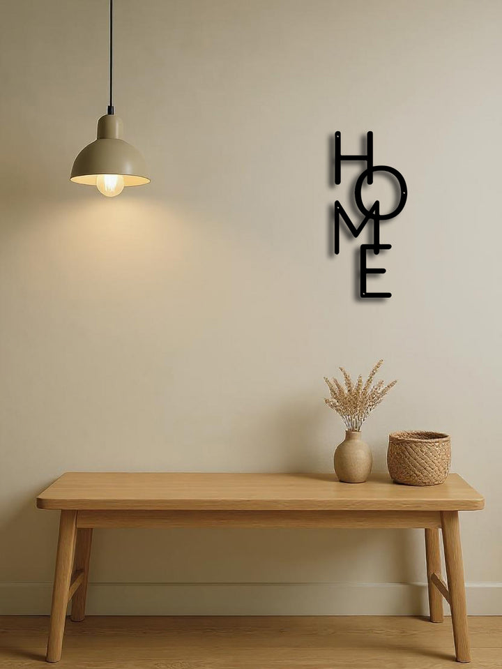 Close-up of matte metal finish on HOME letter sign