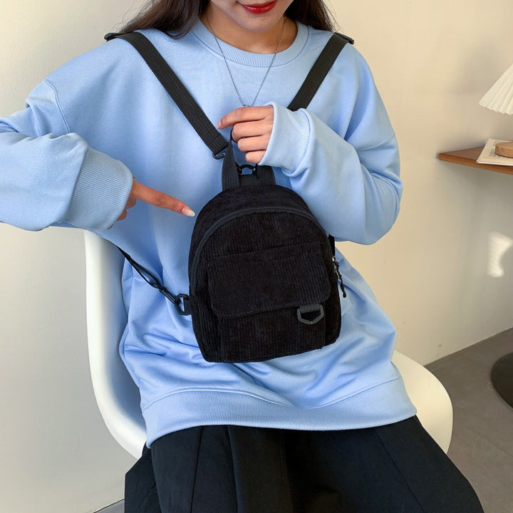 Women's corduroy mini backpack, external pocket detail