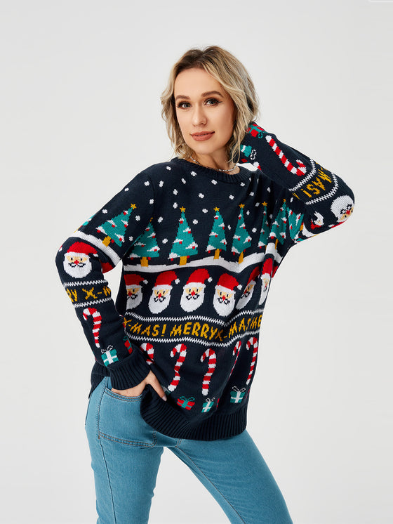 Woman posing in a navy holiday sweater with Merry X-Mas band