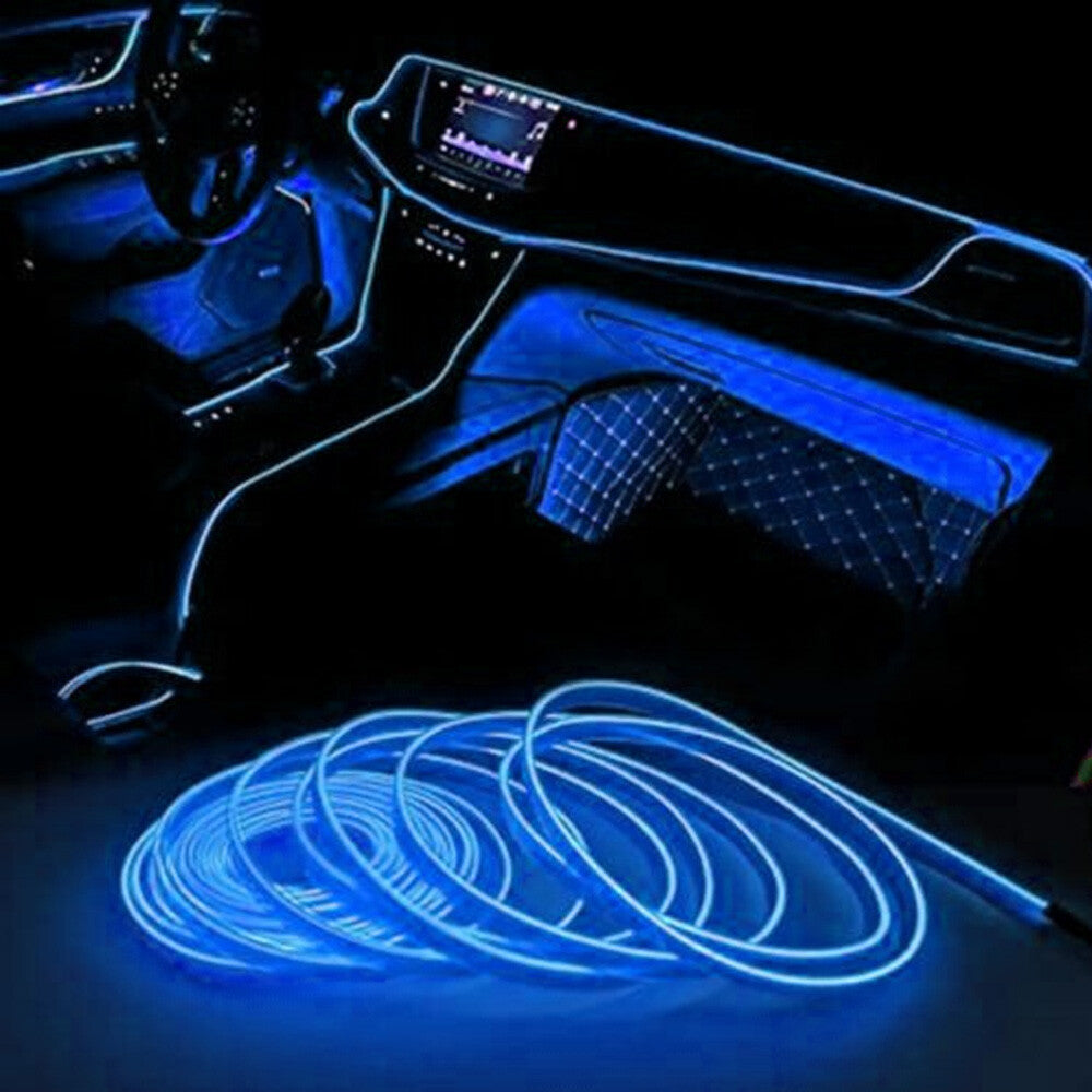 Car interior glowing with blue ambient light at night