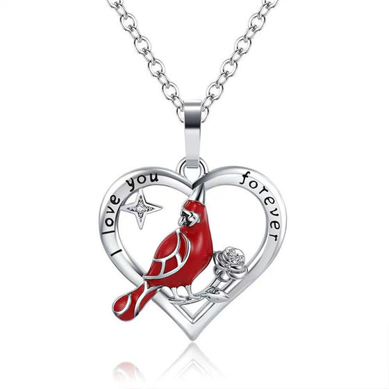 Cardinal heart pendant engraved with a love message and a small rose