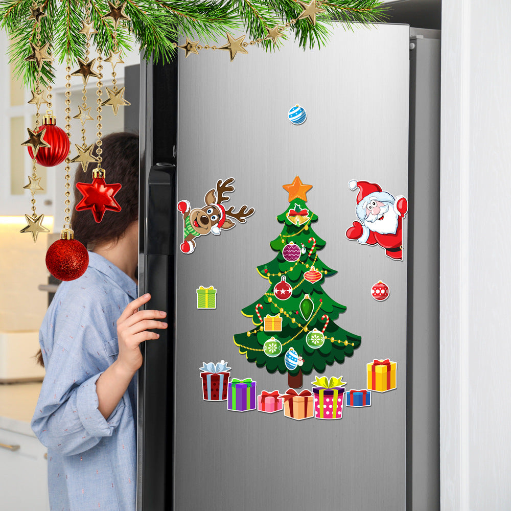 Woman beside a refrigerator decorated with a Christmas tree decal set