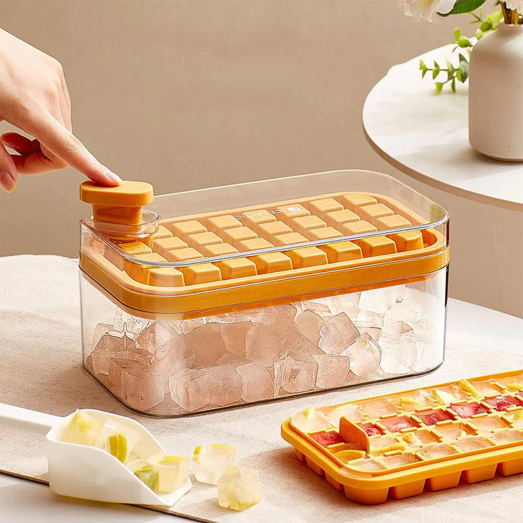 Ice cube maker shown with the lid open revealing the ice tray