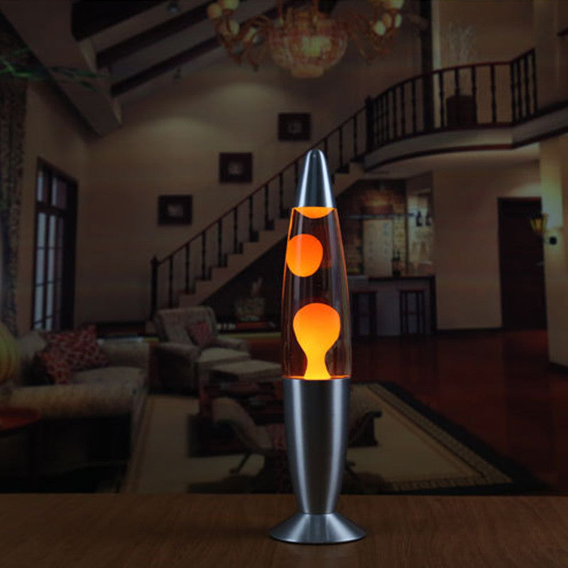 Orange wax motion lamp in a dim room