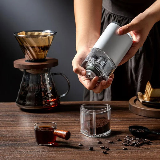 Portable USB coffee grinder standing upright