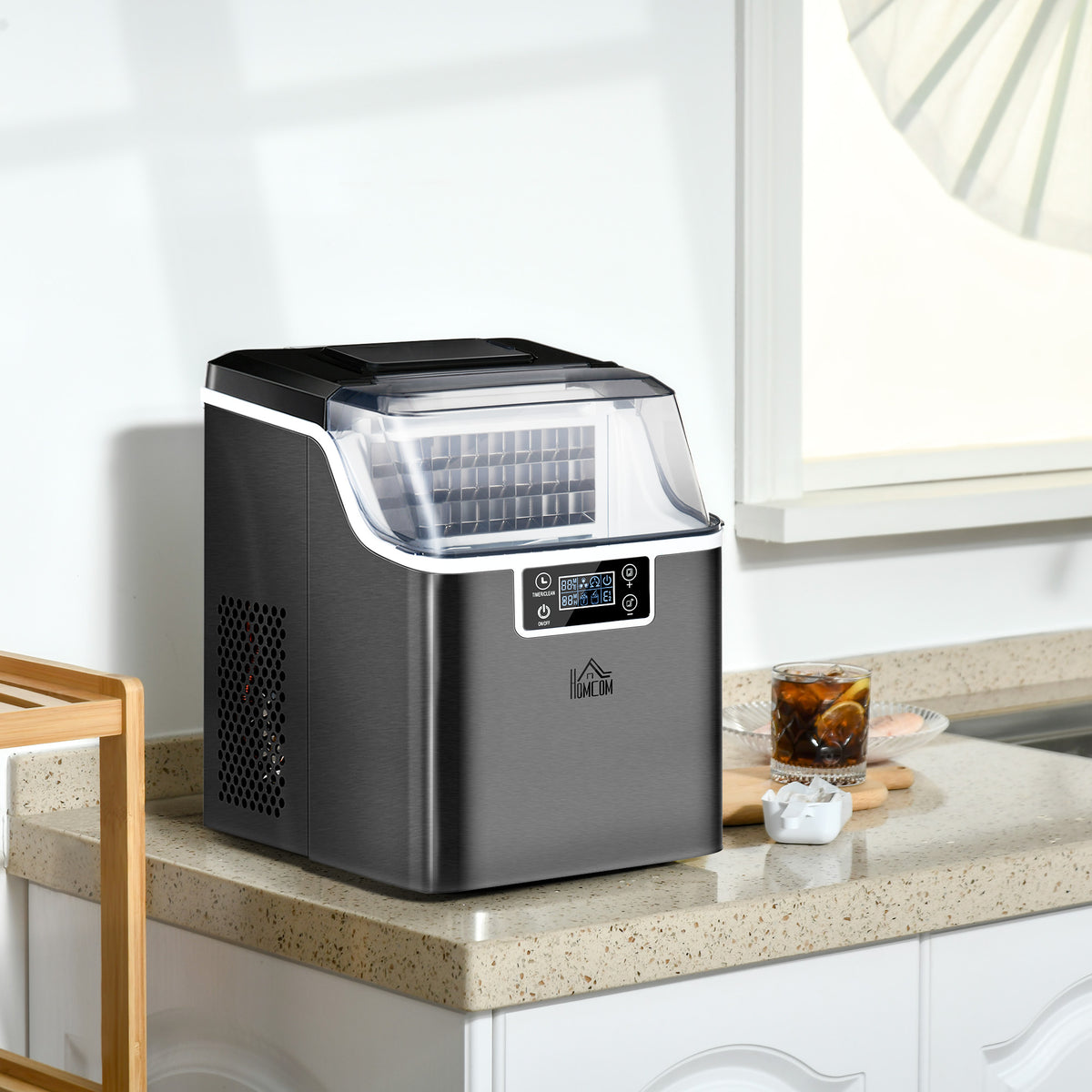 Portable ice maker on kitchen countertop