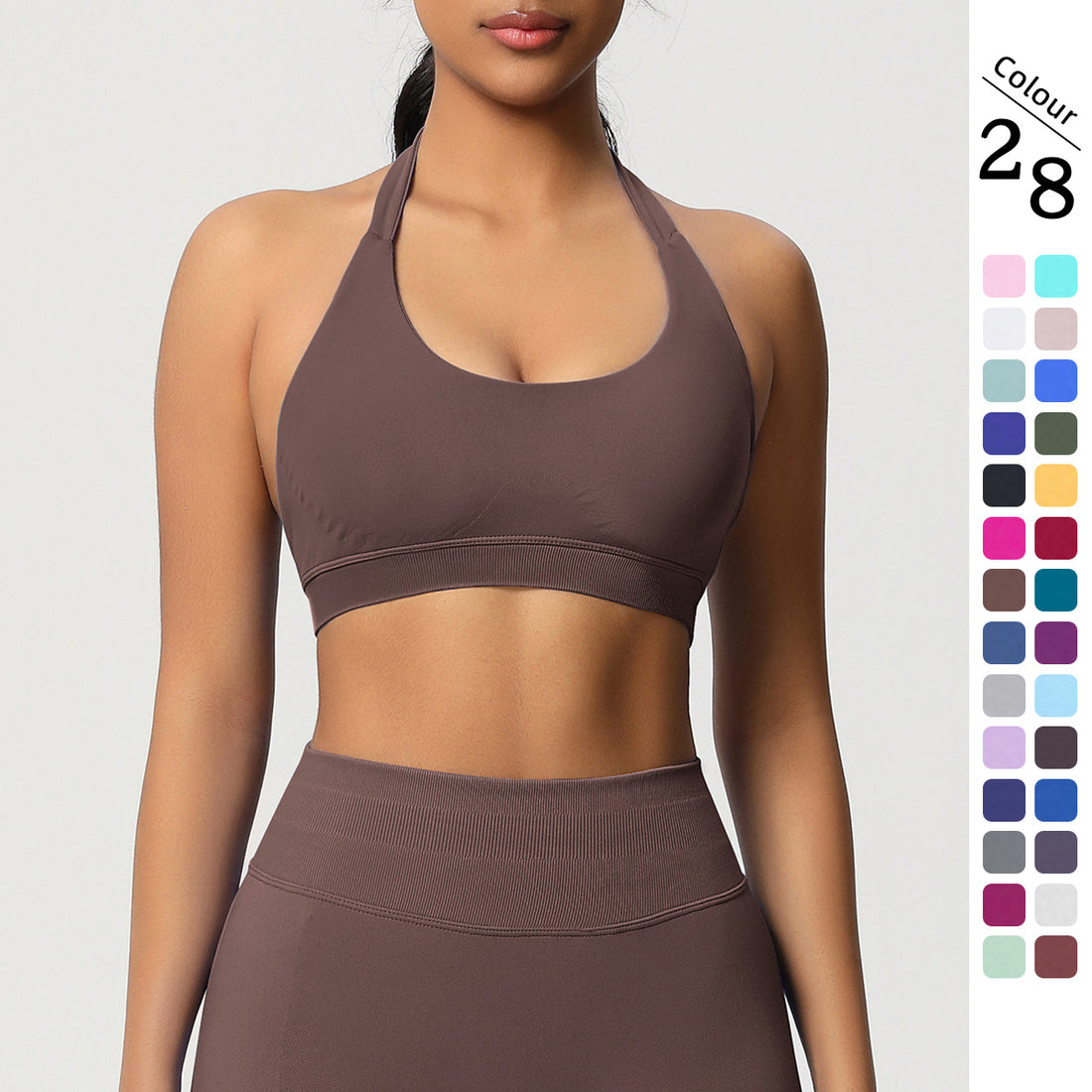 Women's seamless strappy back sports bra and leggings set, photo 1