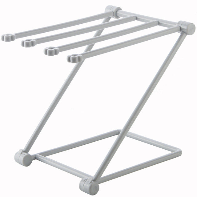 Foldable storage rack compact footprint