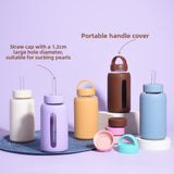 Insulated borosilicate glass cup with straw lid and silicone sleeve