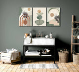 Boho canvas set displayed above a bed