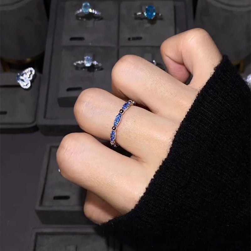 Shining blue small prong-set diamond ring