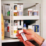 Spice rack shown fitting inside an upper kitchen cabinet