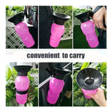 Portable pet water bottle being carried on a walk