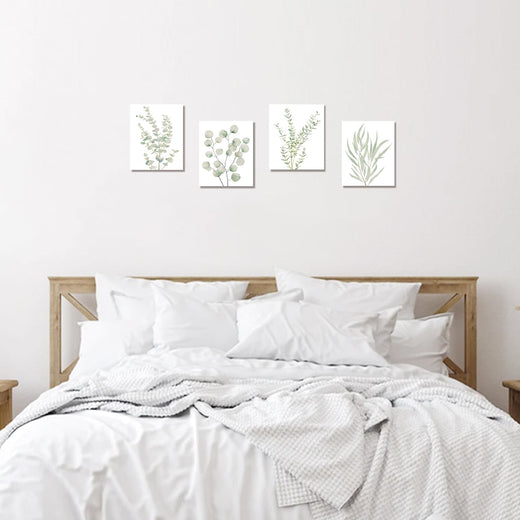 Botanical canvas set in a bedroom gallery wall layout