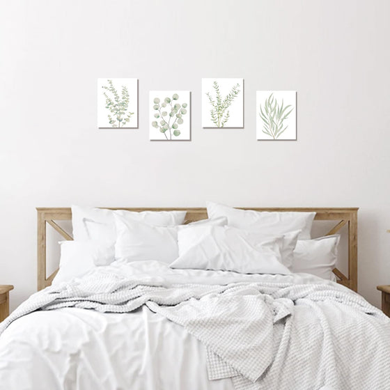 Botanical canvas set in a bedroom gallery wall layout