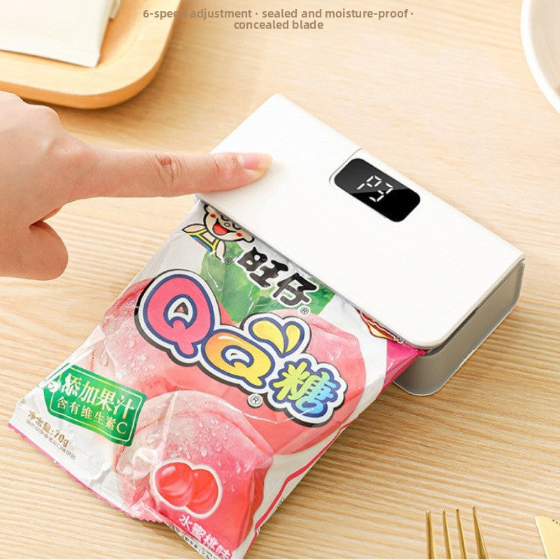 Small charging sealing machine