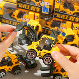 Miniature toy of a reversing engineering vehicle