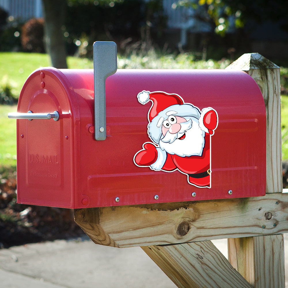 Red mailbox decorated with a Santa Christmas decal