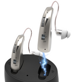 Wireless hearing aid with magnetic attachment