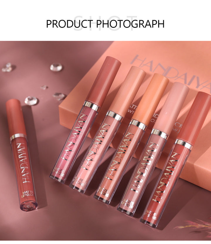 Close-up of liquid lipstick applicator tip with matte formula